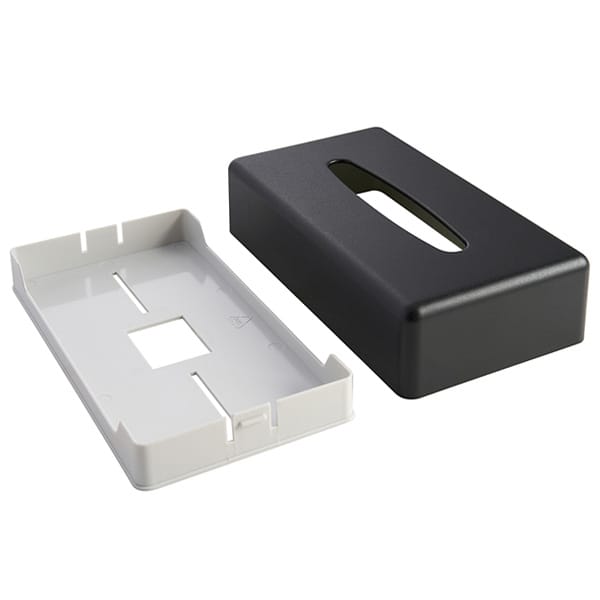 hotel smooth tissue box with detachable bottom in light plastic placed next to the cover