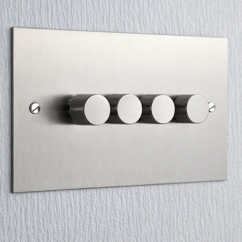 Bauhaus Range Electrical switches four dimmer light switch in silver on a wall in a hotel room by Hotel Lock and Safe