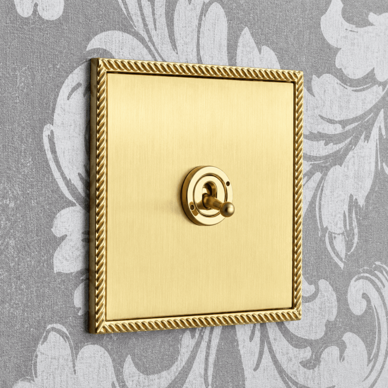 Gainsborough Range gold coloured light switch with bezzled edges for hotel rooms by Hotel Lock and Safe