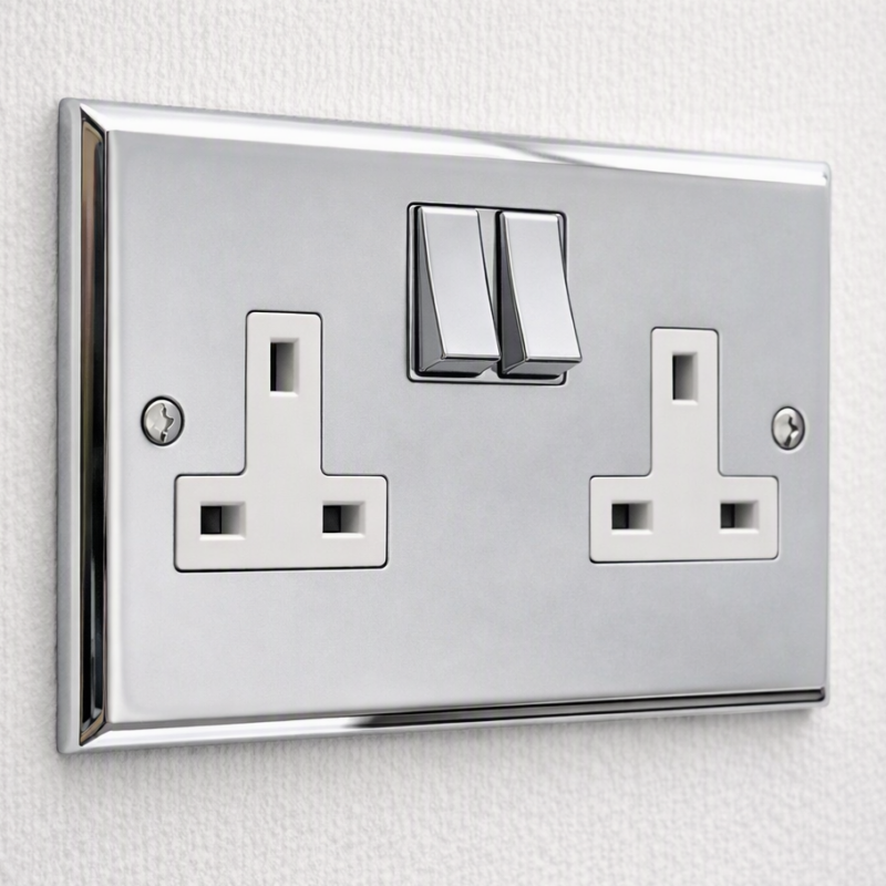 double wall socket in polished silver with raised edges for hotel guest rooms by Hotel Lock and Safe