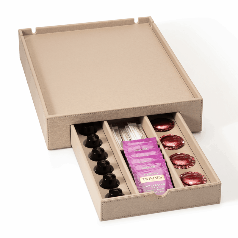 Faux leather warm beige welcome tray with drawer open showing coffee pods in compartments