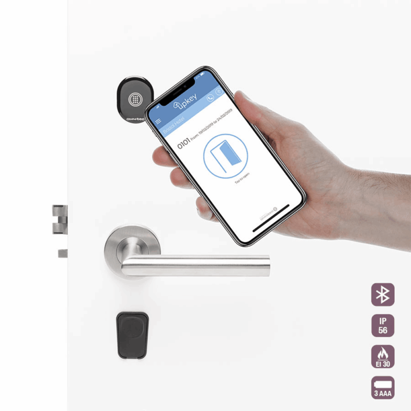 omnitec evo hotel door lock with a hand holding a mobile phone showing the management app