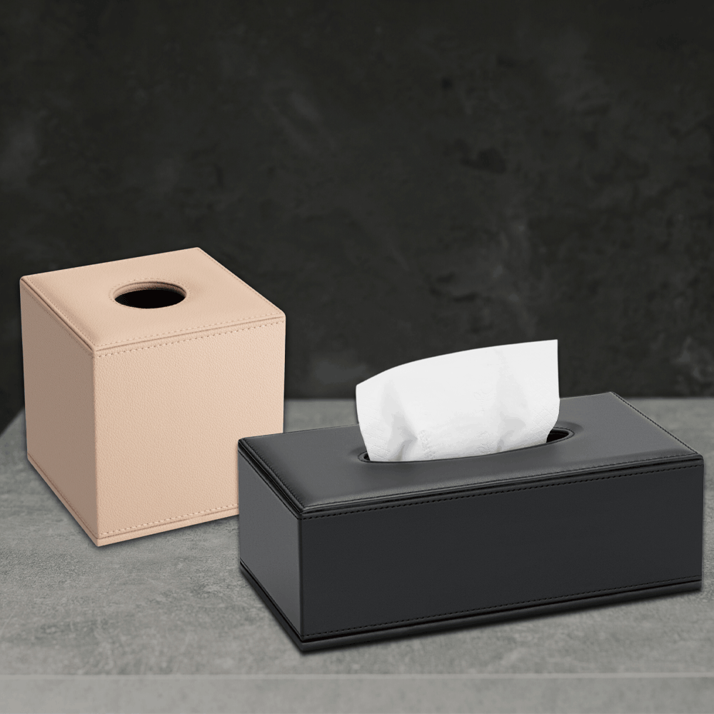 Warm Beige Shape cube tissue box with a black SWEEP rectangular tissue box holder on a grey counter