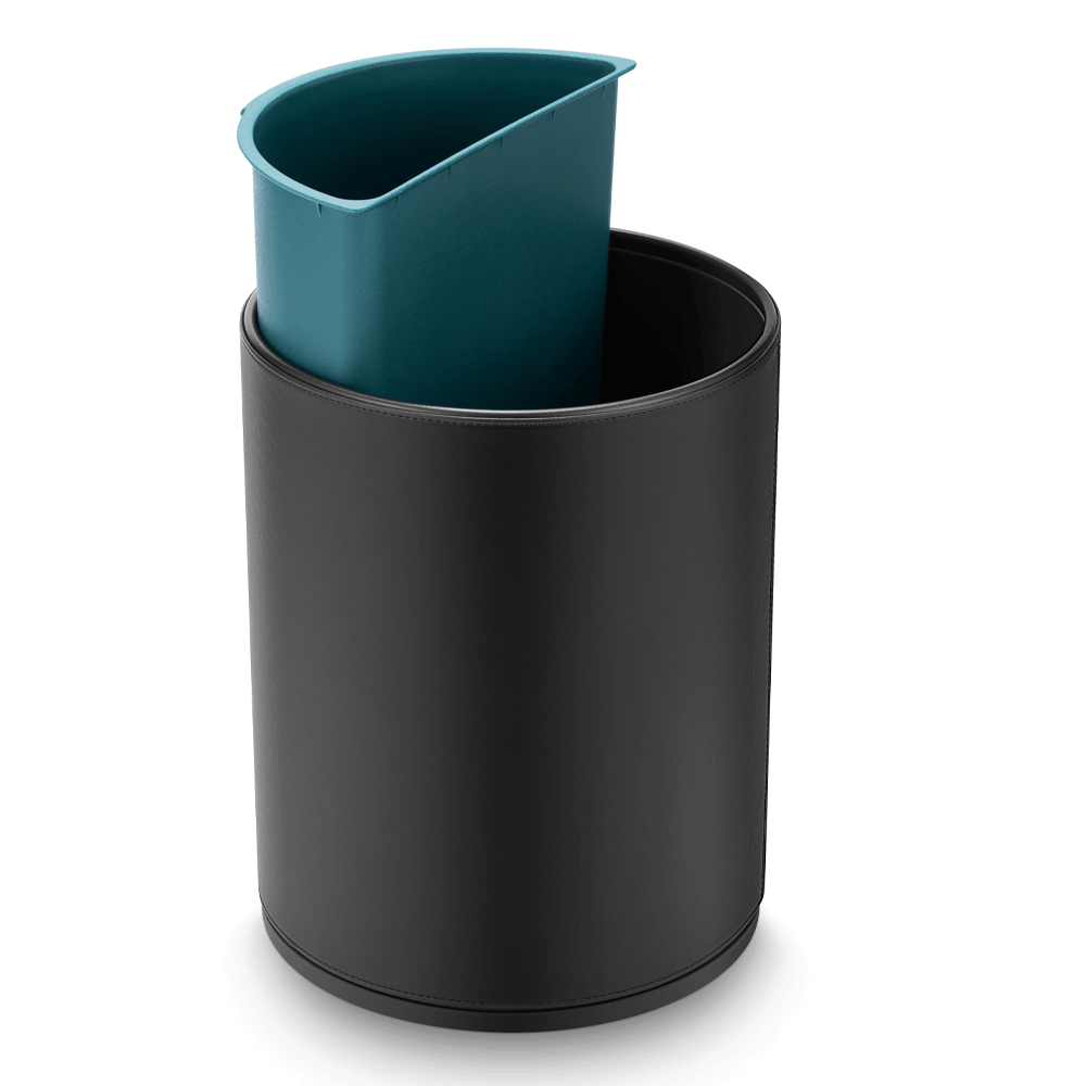Green recycling insert being lifted from the Black SUMO waste bin